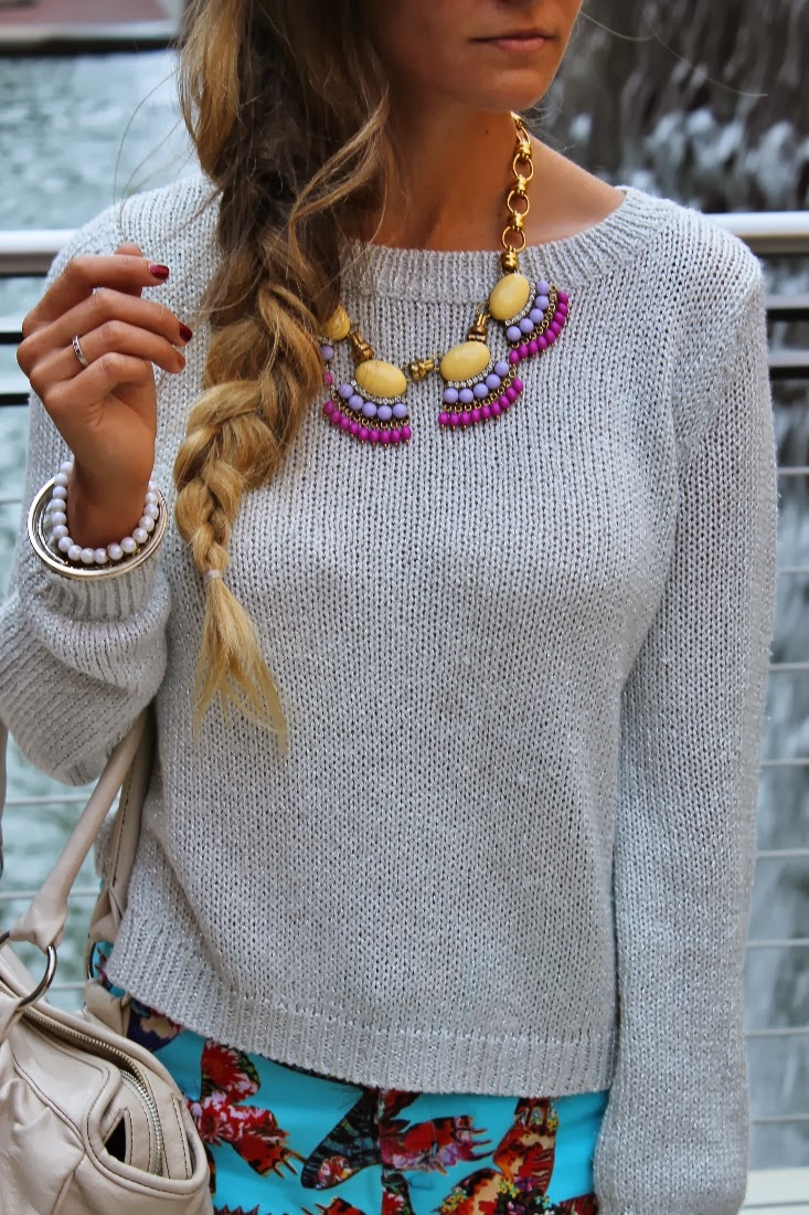 Statement Necklaces, grey sweater, hairstyle