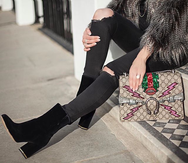 Stone statement ring, ripped jeans