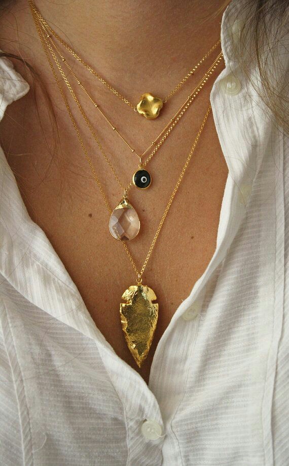 V-neck with layered necklaces