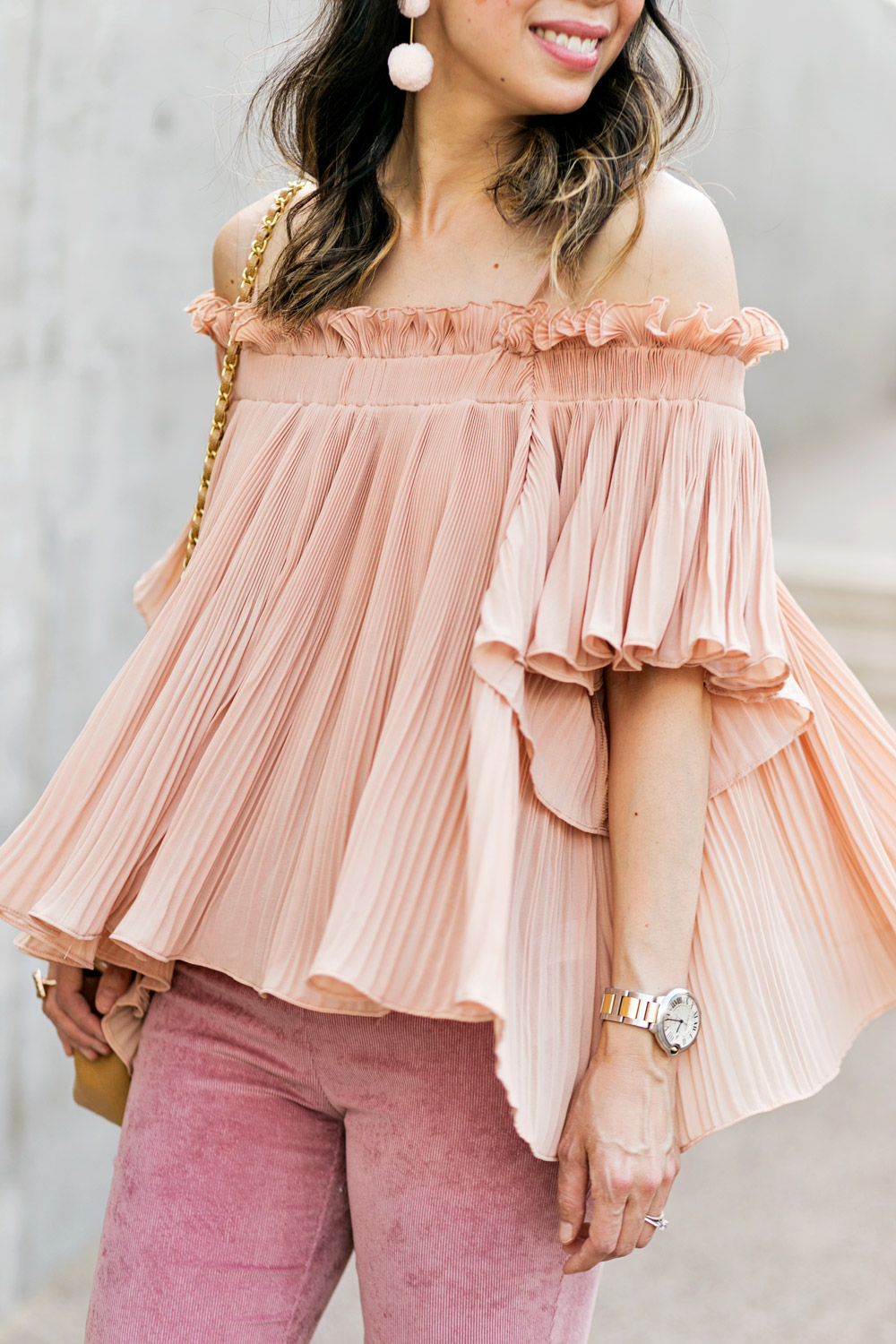 Pompom earrings, off shoulder pleated pink top