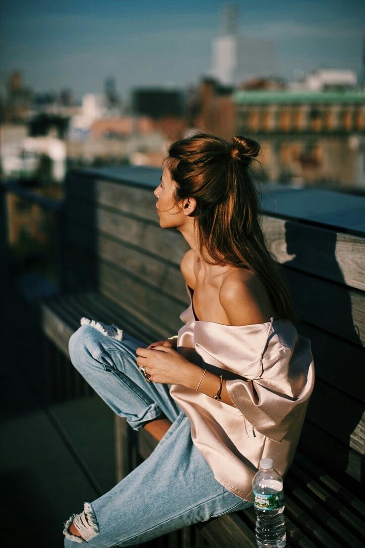 off-shoulder outfit with delicate necklaces