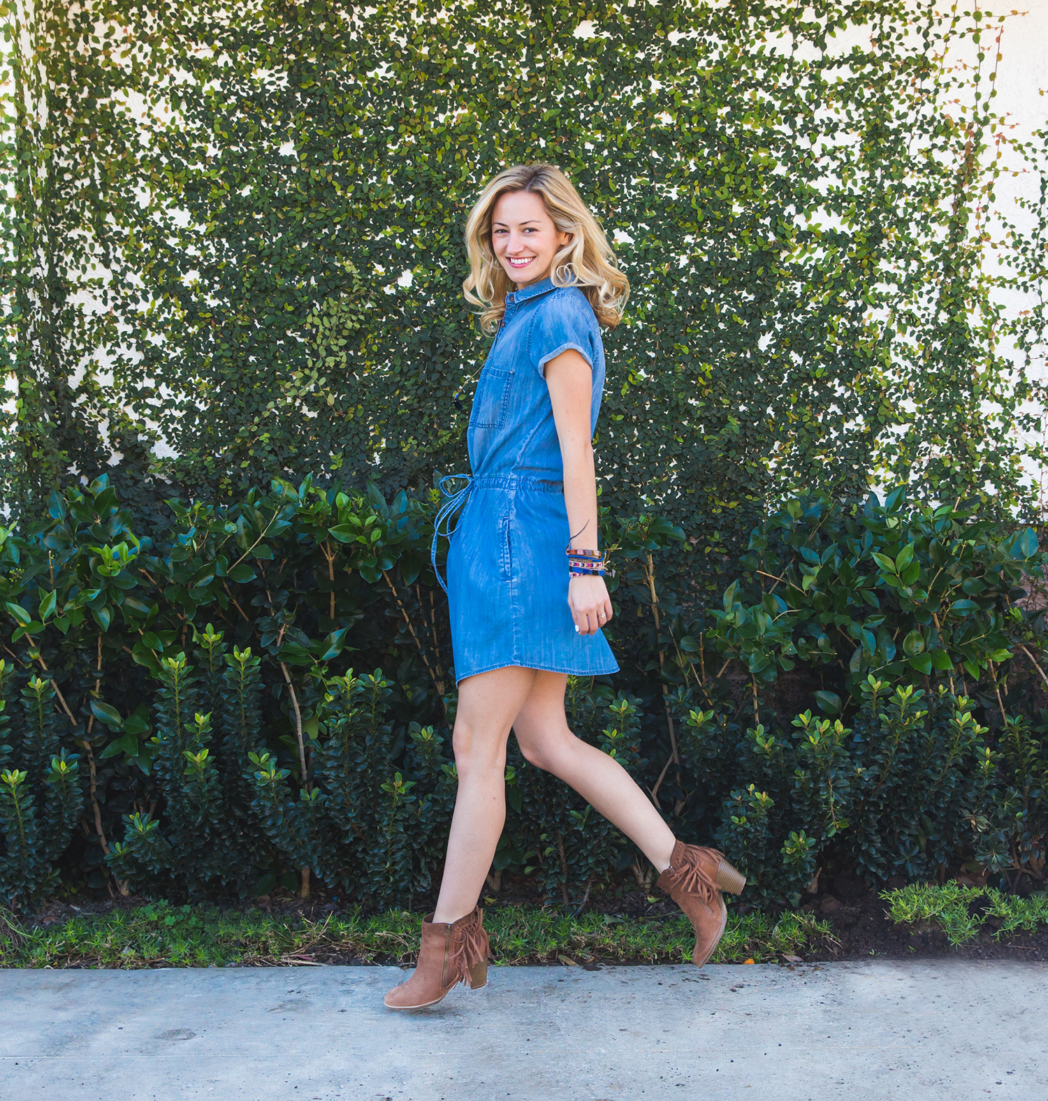 Blue denim dress, stacked bracelets, street style